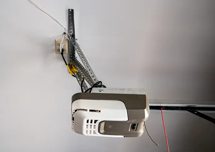 motor box for a garage door opener pulley system